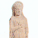 3 Statuetta fittile di offerente con fiore, tomba di Monte Bubbonia 